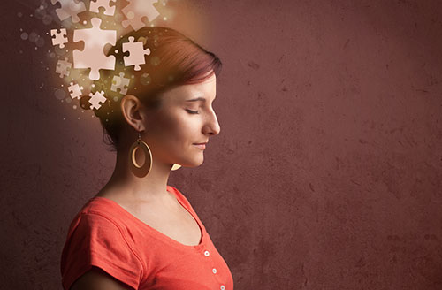 woman with puzzle pieces